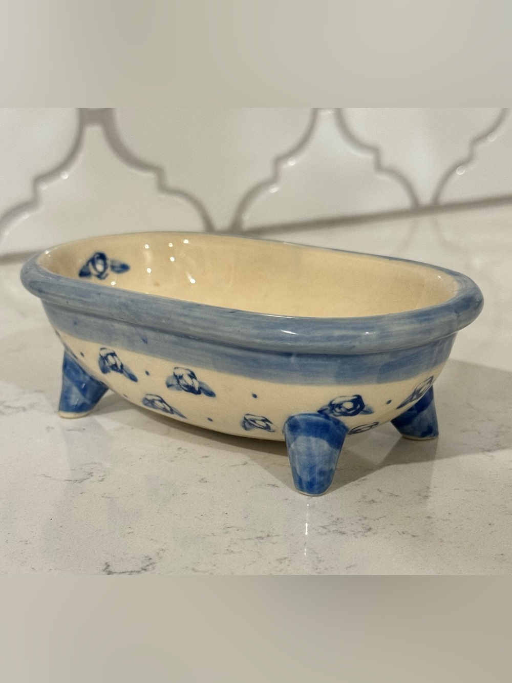 ceramic footed bathtub-shaped soap dish or decorative holder